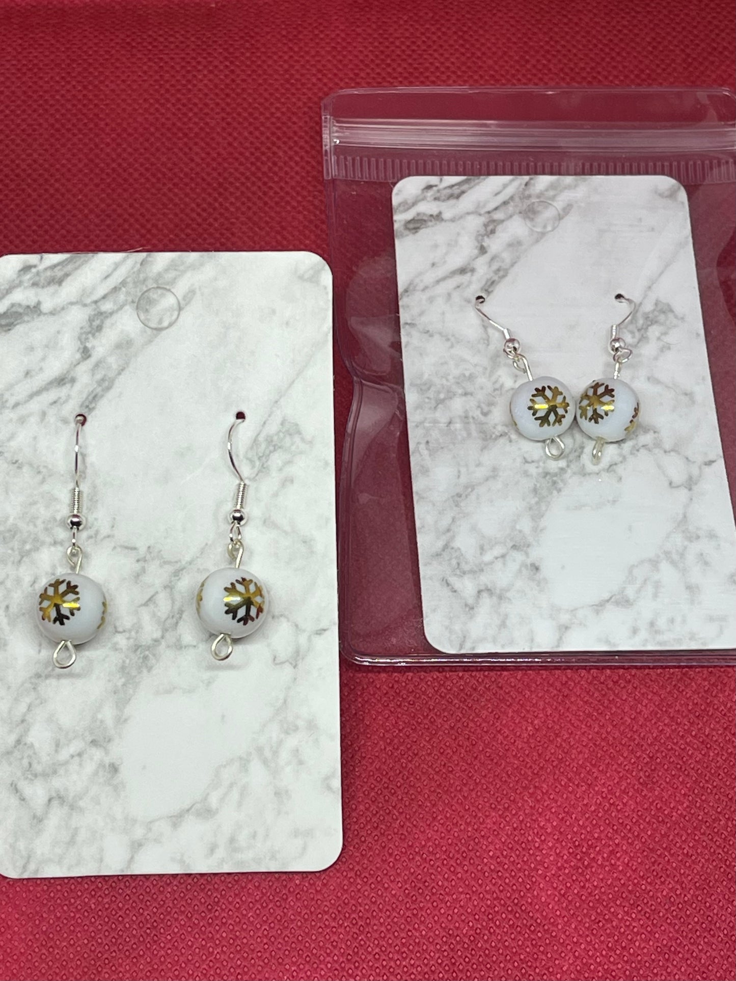 Gold snowflake earrings