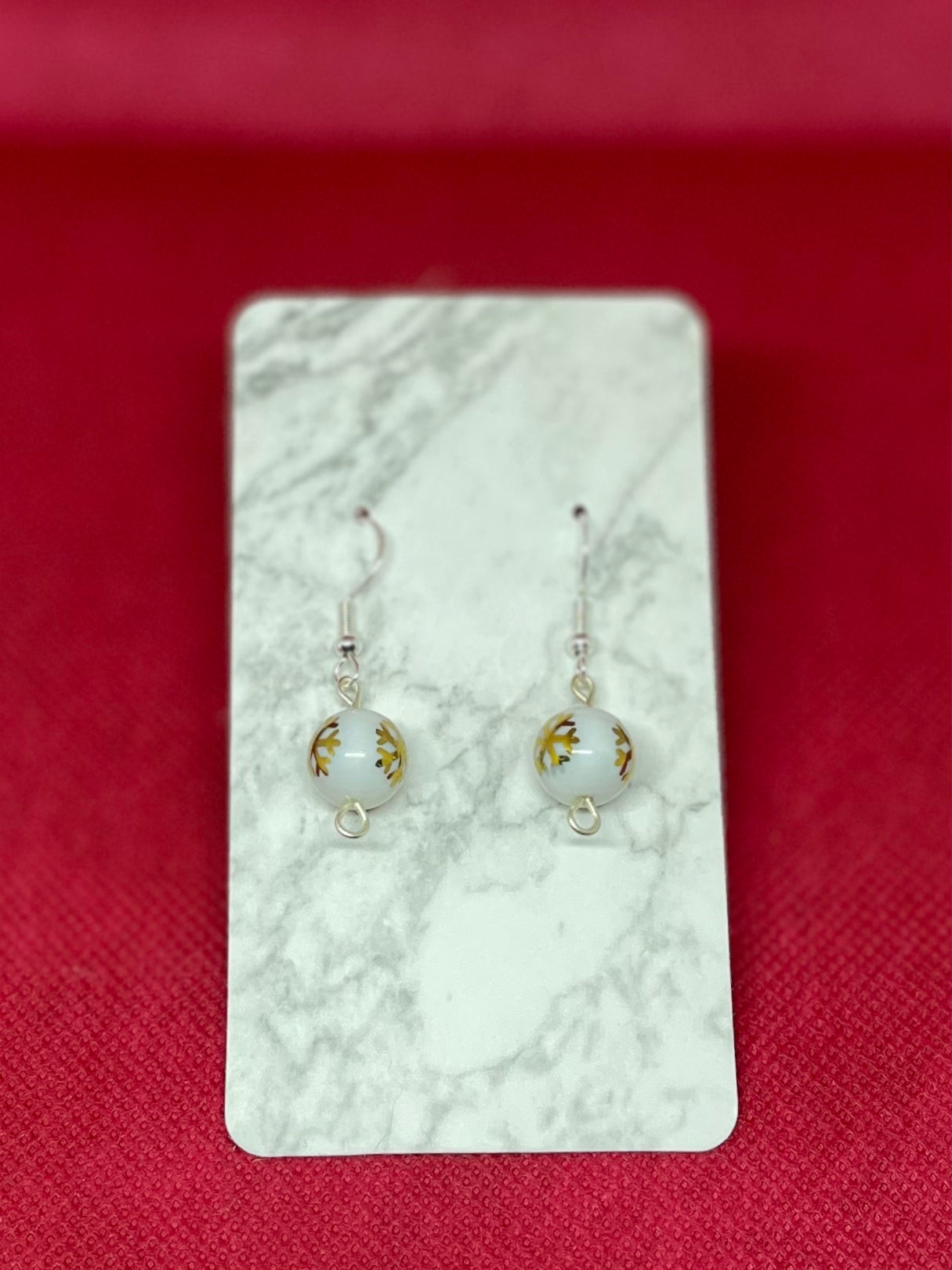 Gold snowflake earrings