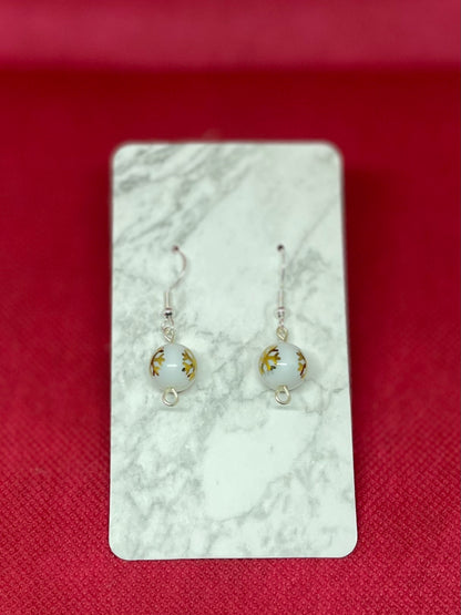 Gold snowflake earrings