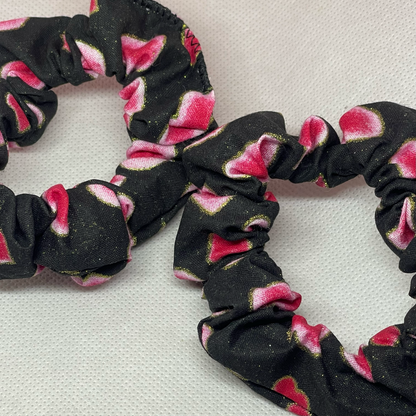 Skinny black scrunchie with pink hearts