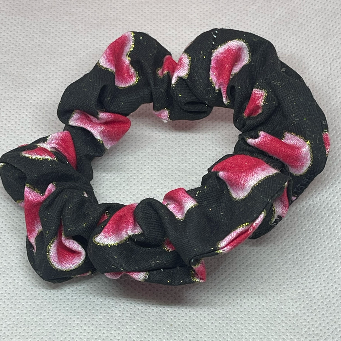 Skinny black scrunchie with pink hearts