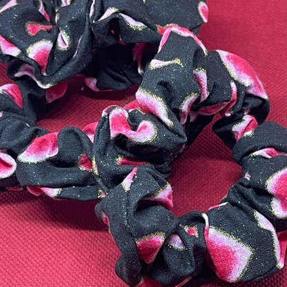 Skinny black scrunchie with pink hearts